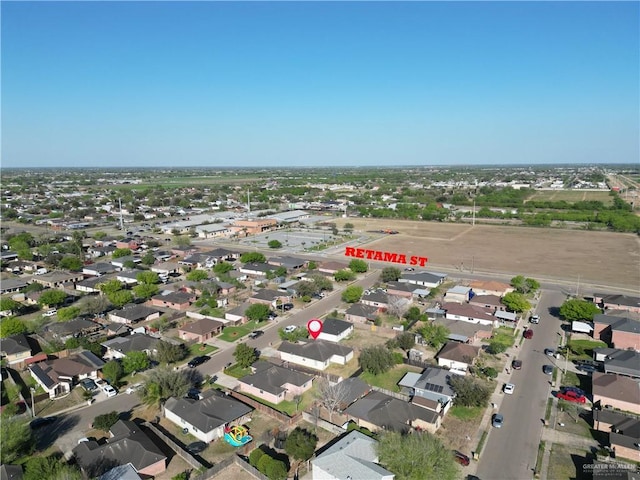 drone / aerial view with a residential view