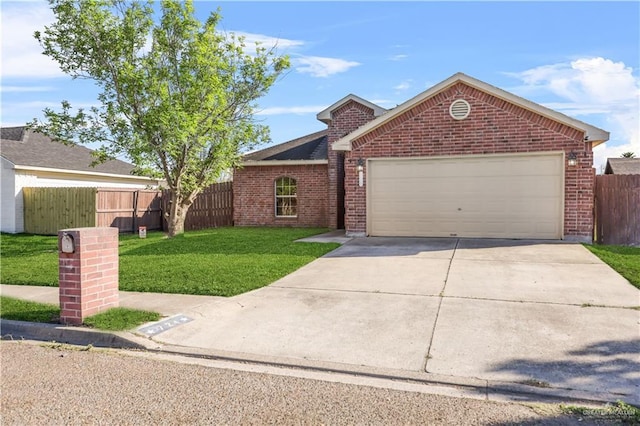 view of front facade featuring brick siding, concrete driveway, a front lawn, and fence