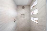 bathroom with a shower