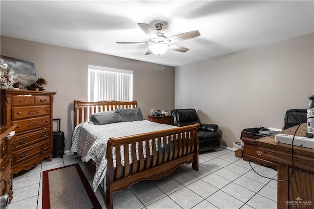 bedroom with ceiling fan and light tile patterned floors