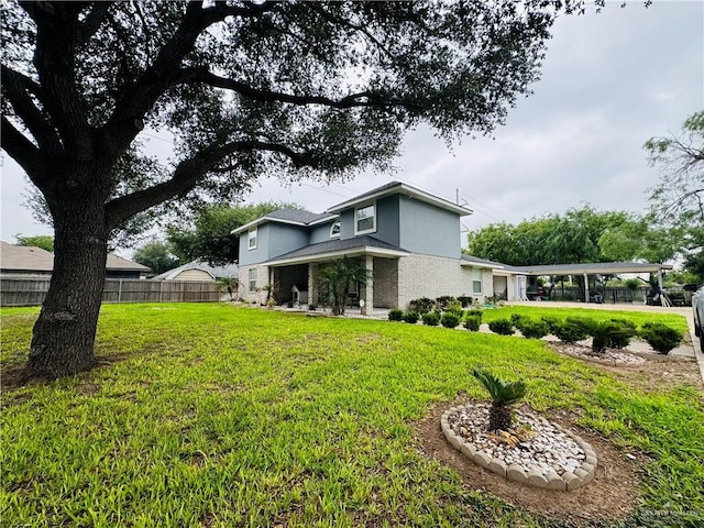 exterior space with a yard