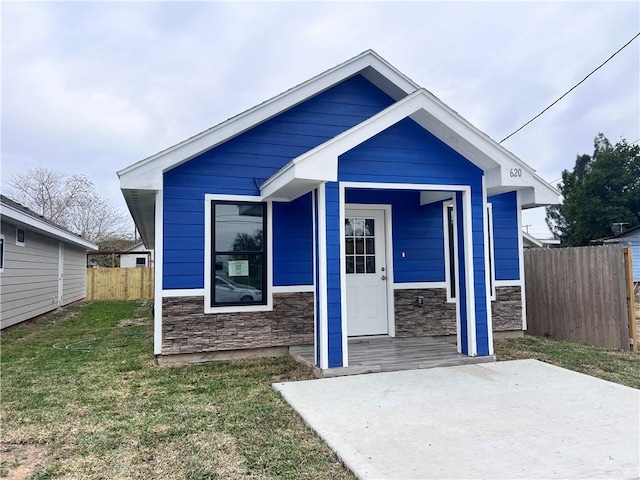 bungalow with a front lawn