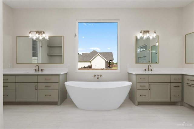 17956 Garrett Rd, Harlingen, TX 78552 - bathroom featuring a freestanding tub and two vanities