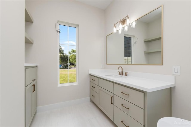 17956 Garrett Rd, Harlingen, TX 78552 - bathroom featuring vanity and baseboards