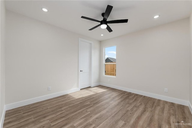 17956 Garrett Rd, Harlingen, TX 78552 - unfurnished room with wood finished floors, ceiling fan, and recessed lighting