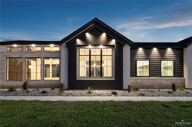 17956 Garrett Rd, Harlingen, TX 78552 - view of property exterior featuring a yard and stucco siding