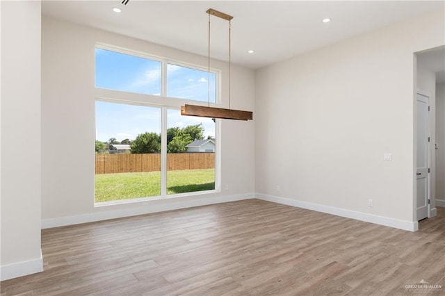 17956 Garrett Rd, Harlingen, TX 78552 - unfurnished dining area featuring light wood finished floors and recessed lighting