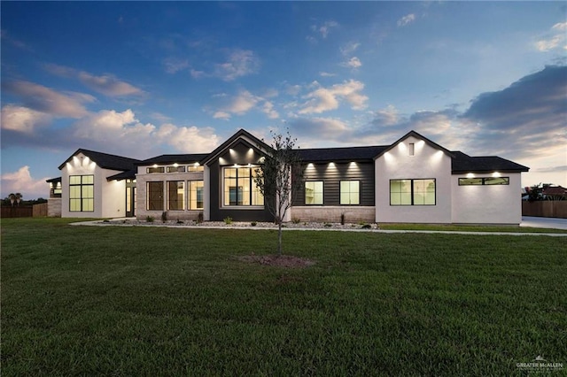 17956 Garrett Rd, Harlingen, TX 78552 - rear view of house featuring a yard