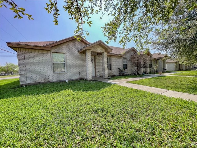 ranch-style home with a front yard