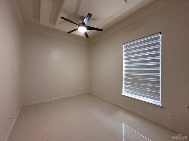 empty room featuring ceiling fan and light tile patterned floors