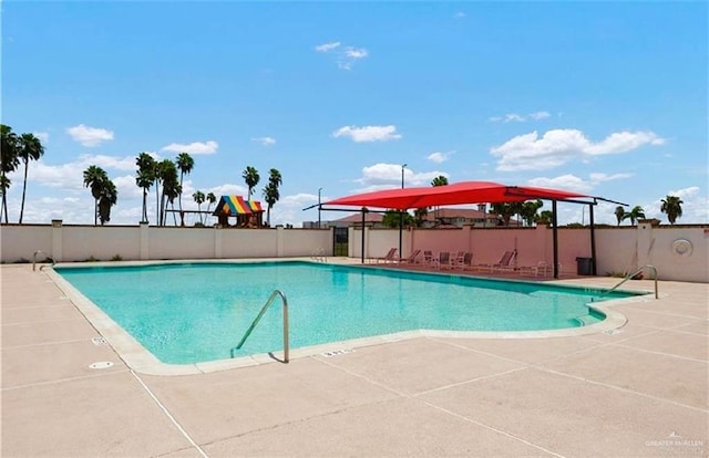 1518 Tierra Bella, Weslaco, TX 78596 - community pool with a patio and fence