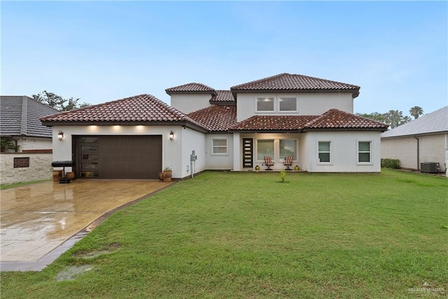 1518 Tierra Bella, Weslaco, TX 78596 - view of front of home with an attached garage, stucco siding, and a front yard
