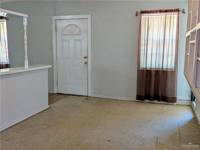 605 8th St, Hidalgo, TX 78557 - entryway with healthy amount of natural light and baseboards