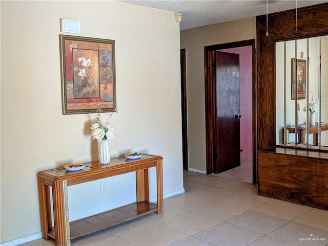 605 8th St, Hidalgo, TX 78557 - hallway with light tile patterned flooring