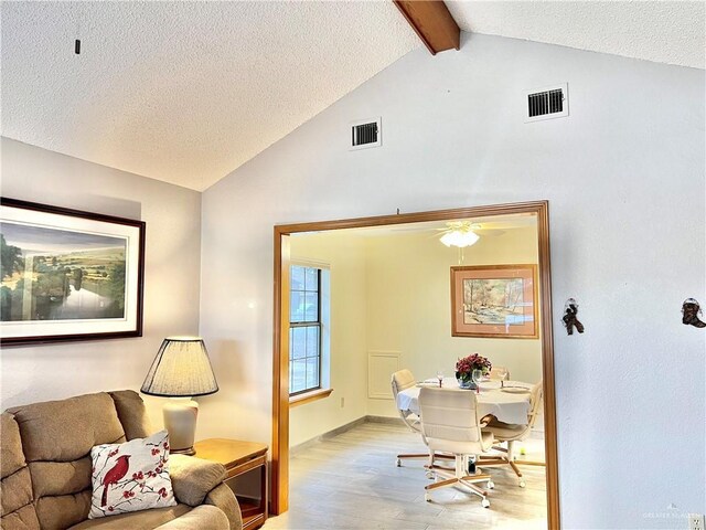 kitchen with backsplash and ceiling fan