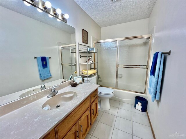 bathroom featuring vanity and a textured ceiling