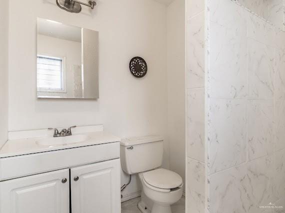 131 N Missouri Ave, Mercedes, TX 78570 - bathroom with toilet, a shower, and vanity