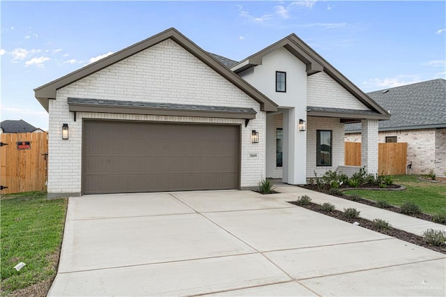 view of front of property featuring a garage