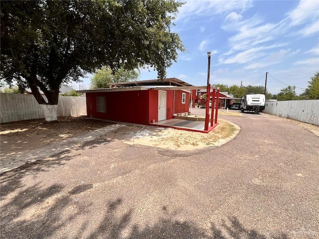 3300 Pradera St, Mission, TX 78574 - view of outbuilding featuring asphalt driveway