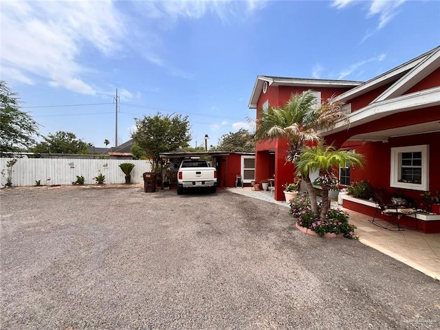 3300 Pradera St, Mission, TX 78574 - view of home's exterior with driveway and a carport