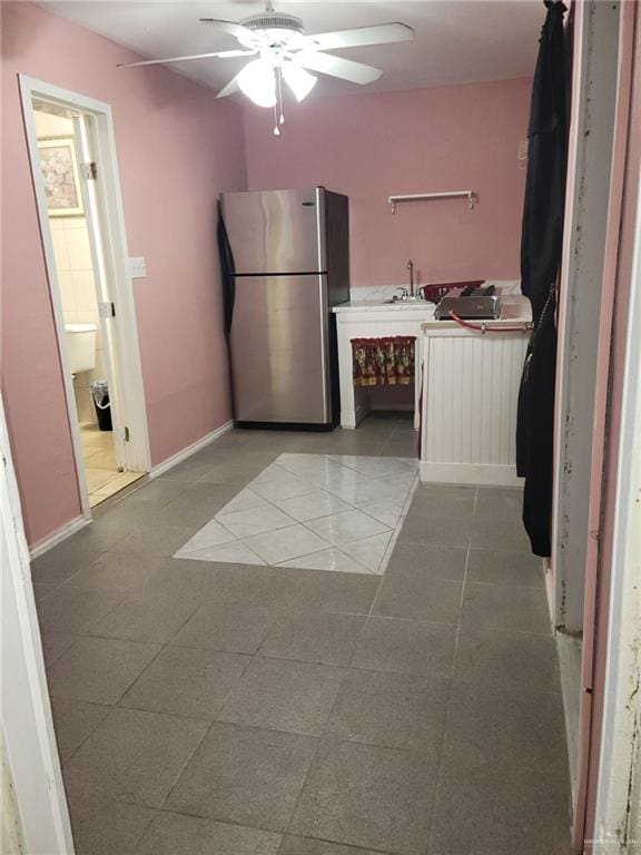 3300 Pradera St, Mission, TX 78574 - kitchen featuring freestanding refrigerator, ceiling fan, tile patterned floors, and light countertops