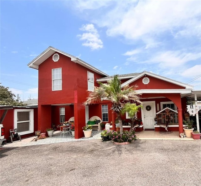 3300 Pradera St, Mission, TX 78574 - back of property featuring a patio and stucco siding
