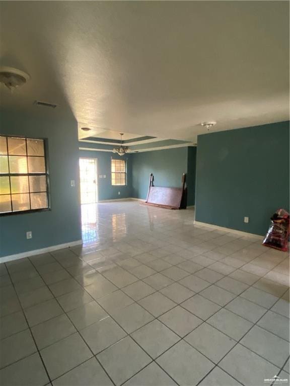 unfurnished room featuring tile patterned flooring