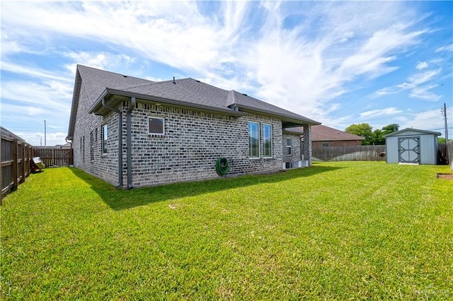 16593 W Mccullar Ct, Harlingen, TX 78552 - back of property with a shingled roof and brick siding