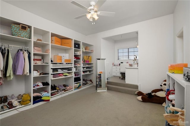 playroom featuring ceiling fan and carpet flooring