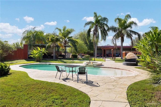 view of swimming pool featuring a gazebo, a lawn, a patio, and an in ground hot tub