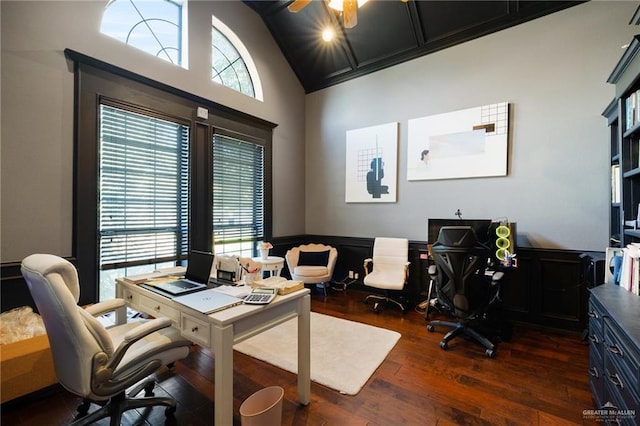 home office featuring ceiling fan, dark hardwood / wood-style flooring, high vaulted ceiling, and a wealth of natural light