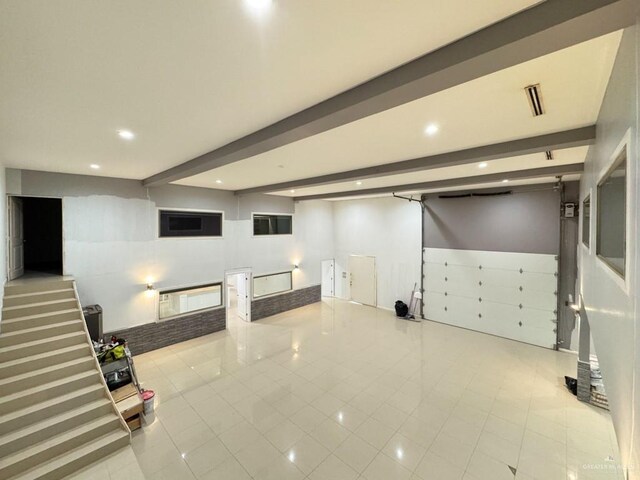 basement with light tile patterned floors