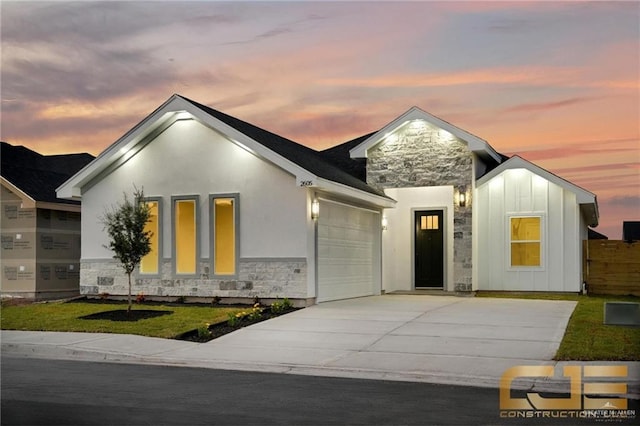 view of front of property with a garage