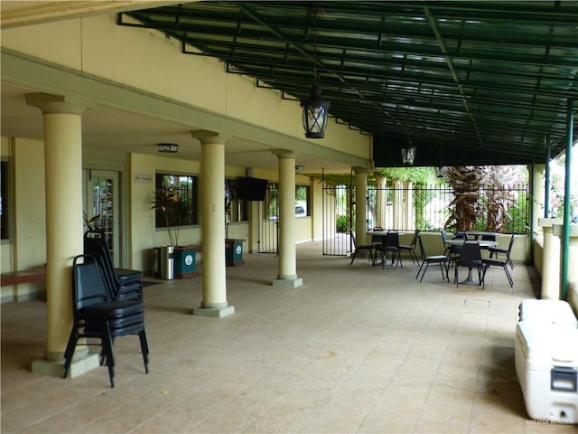 3319 Country Club Dr N, Edinburg, TX 78542 - view of patio with outdoor dining space and fence