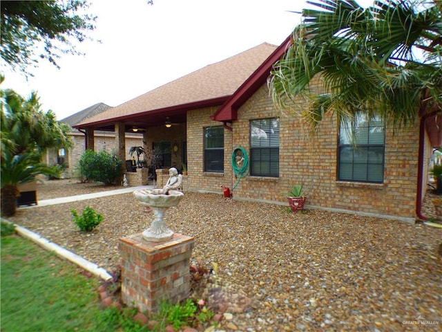 3319 Country Club Dr N, Edinburg, TX 78542 - ranch-style house featuring brick siding and roof with shingles