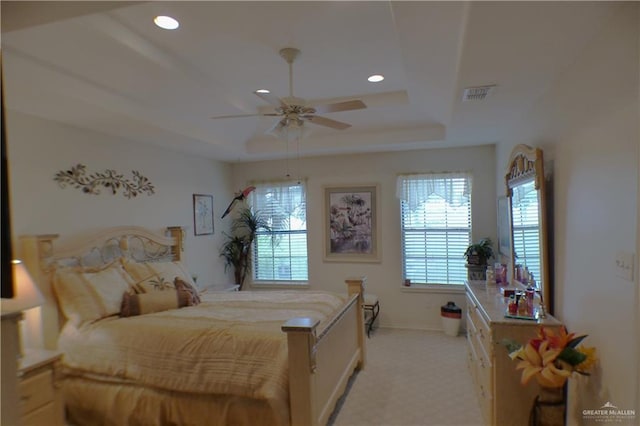 3319 Country Club Dr N, Edinburg, TX 78542 - bedroom featuring a raised ceiling, light colored carpet, baseboards, recessed lighting, and a ceiling fan