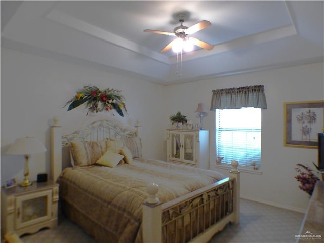 3319 Country Club Dr N, Edinburg, TX 78542 - bedroom featuring a tray ceiling, light colored carpet, baseboards, and ceiling fan