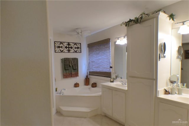 3319 Country Club Dr N, Edinburg, TX 78542 - full bath featuring ceiling fan, a garden tub, two vanities, and tile patterned floors
