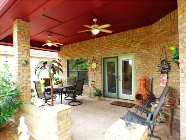 3319 Country Club Dr N, Edinburg, TX 78542 - view of patio with ceiling fan, outdoor dining space, and french doors