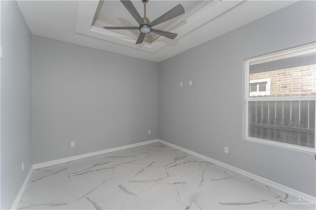 unfurnished room with ceiling fan