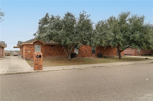 view of front of property featuring central air condition unit