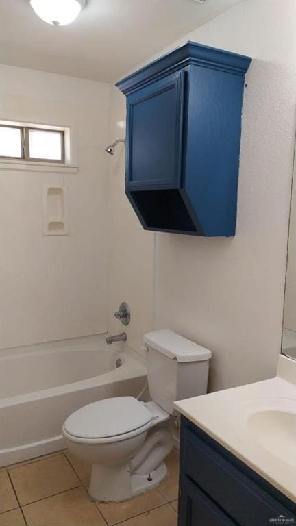 full bathroom with vanity, tile patterned floors, washtub / shower combination, and toilet