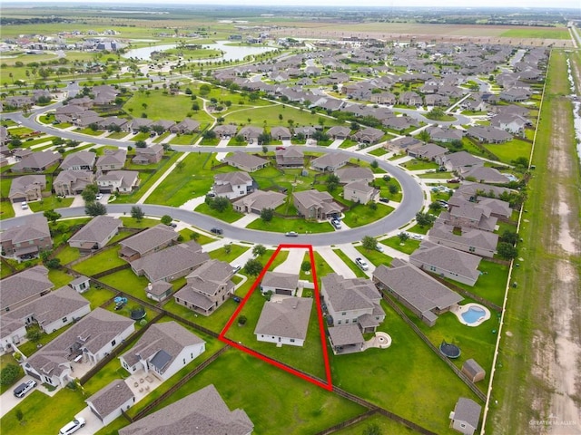 5237 Lost Creek Ln, Mcallen, TX 78504 - aerial view of residential area with property parcel outlined and a large body of water