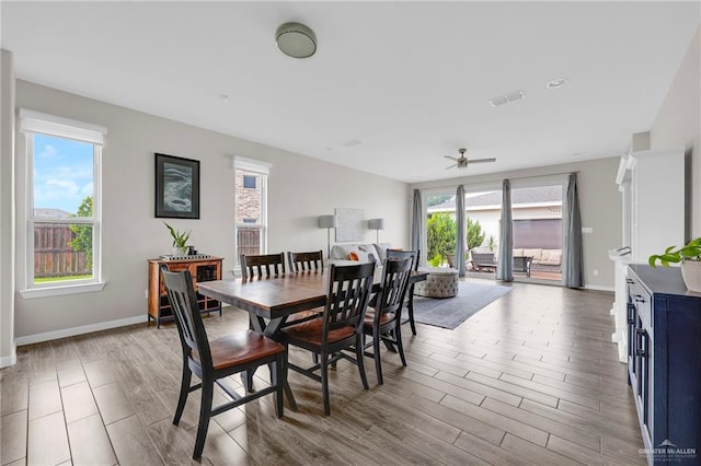 5237 Lost Creek Ln, Mcallen, TX 78504 - dining area with wood finished floors and a ceiling fan