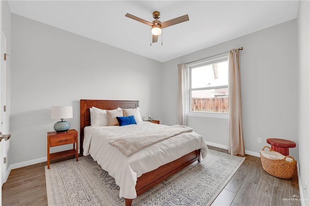 5237 Lost Creek Ln, Mcallen, TX 78504 - bedroom with wood finished floors and a ceiling fan