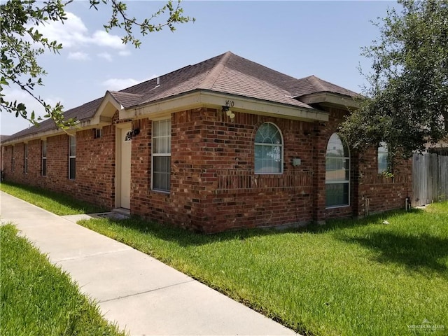 view of property exterior with a yard