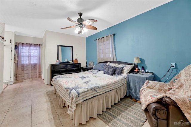 bedroom featuring ceiling fan and light tile patterned floors