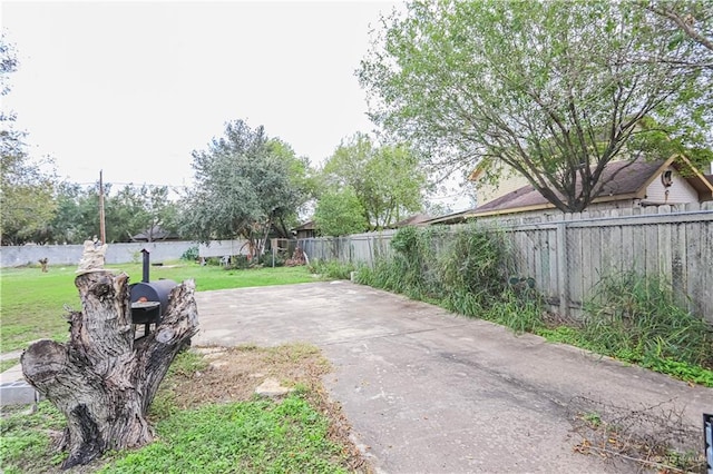 view of yard with a patio area