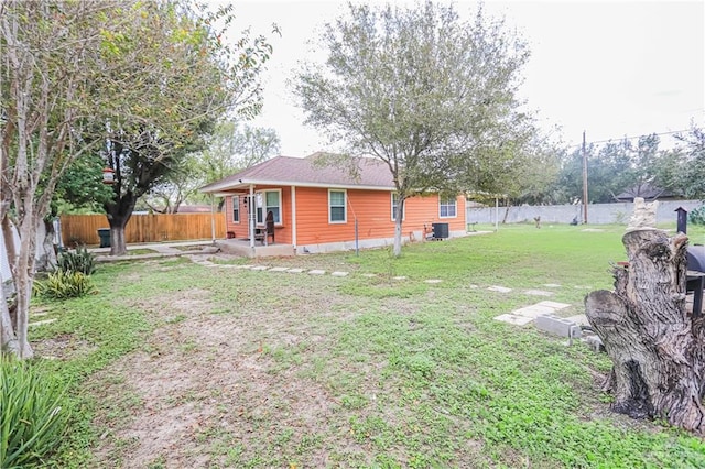 view of yard featuring central AC unit