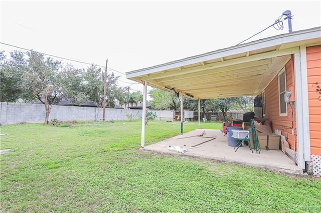 view of yard with a patio area